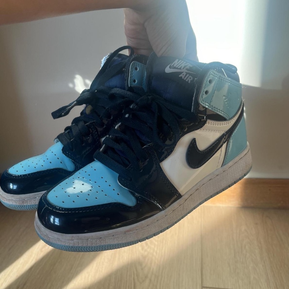 Nike Air Jordan 1 Mid Blue and Black Sneakers